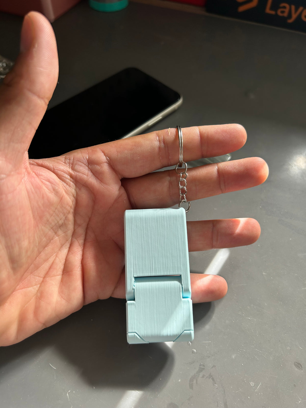 Porta-Chaves 3 em 1 com Suporte para Telemóvel e Abre-Latas